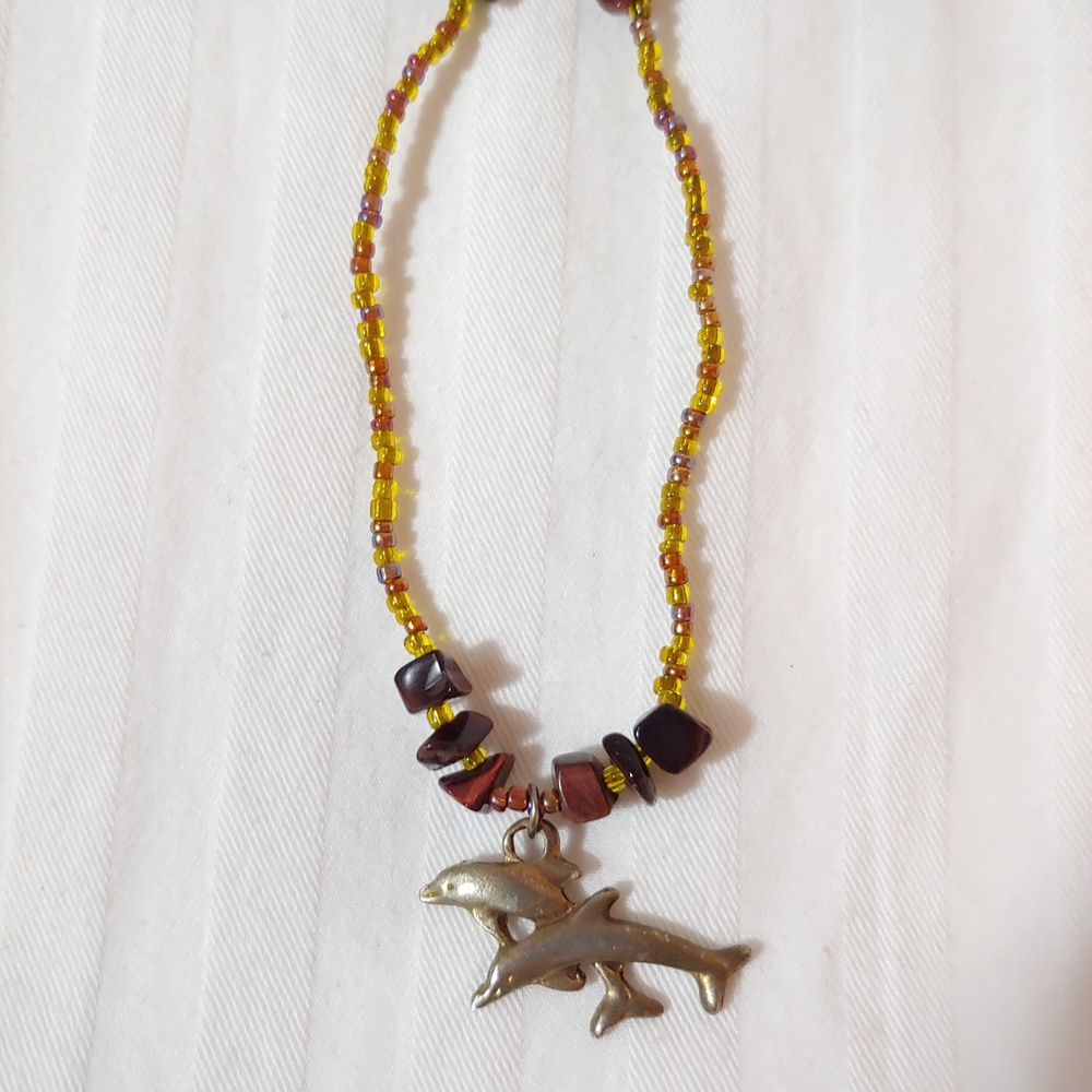 Beaded Necklace with Dolphin Pendant